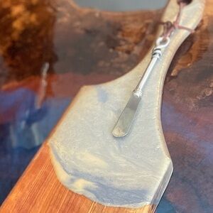 24”L x 6”W “swirl of blues & pearl”, Live Edge, epoxy, bread board